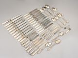 a lot of spoons and spoon spoons on the table
