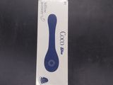 an image of a close up of a blue toothbrush in a box