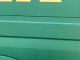 a close up of a van with a sticker on it