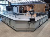 an image of a kitchen with a large island in the middle of the room
