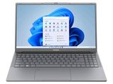 l'ordinateur portable est ouvert sur une surface blanche avec un fond bleu