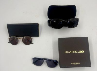 une paire de lunettes de soleil, un étui et une paire de lunettes de soleil