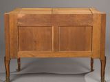 a small wooden cabinet with two doors and a drawer