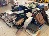 a pile of boxes and boxes on the floor in a room