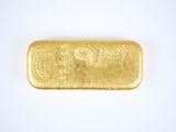 a gold bar on a white background
