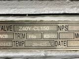 a close up of a metal plate on a machine