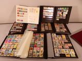 a lot of stamps in a folder on the table