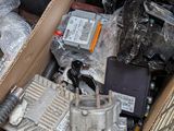 a cardboard box full of electronic equipment in the back of a truck