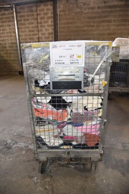 a metal cart with a bunch of clothes in it