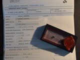 a document with a wax stamp on it sitting on a desk