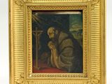 an image of a painting of a man praying in a gold frame