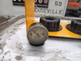 a close up of a thermometer on top of a table