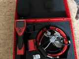 an image of a tool box with tools and a wrench