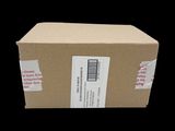 a cardboard box with a sticker on it on a black background