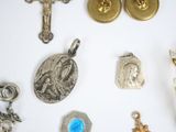 a lot of religious items that are on the table