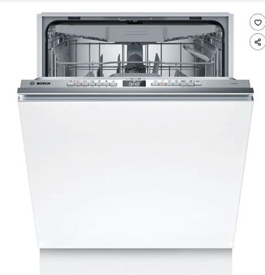 un lave-vaisselle blanc posé sur un comptoir blanc