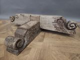 a piece of wood sitting on top of a wooden floor