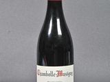 a bottle of wine that is sitting on a table