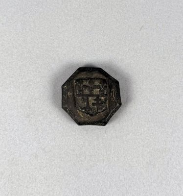 an old coin with a picture of a man on it