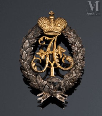 a close up of a badge with a crown on it