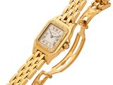 an image of a gold wrist watch with diamonds on it