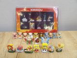 a bunch of small toys that are on a table
