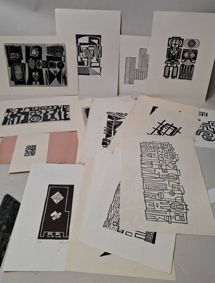 a lot of different types of art work on the table