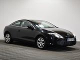 a picture of a black car parked in a garage