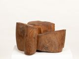 three pieces of wood stacked on top of each other