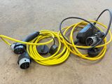 a couple of yellow and black wires connected to a black and yellow cord
