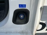 a close up of a car door handle with a sticker on it