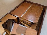 a small room with a lot of wood flooring in it