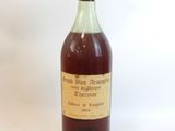 a bottle of liquor that is sitting on a table
