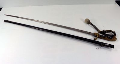 two swords on a white table with a black handle