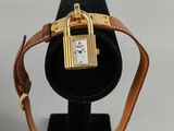 an image of a watch on display on a black display stand
