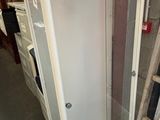 an image of a bathroom with a glass shower door