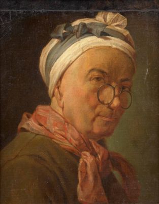 portrait d'une vieille femme portant des lunettes et un turban