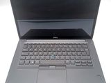 the laptop is open and ready to be used on the desk