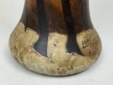 a vase that has a picture of a couple of bears on it