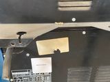 the back end of a machine that is sitting on a table