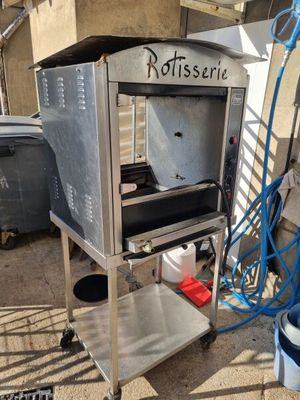 a machine that is sitting on the side of a building