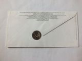 an envelope with a wax seal and a wax stamp on it
