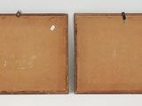 two pieces of brown cardboard are hanging on a white wall