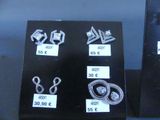 a lot of different types of jewelry on display
