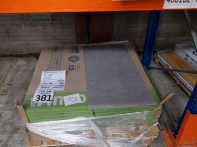 a cardboard box on a pallet in a store