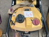 a yellow lawn mower sitting on the ground next to a fire hydrant