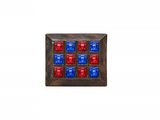 a close up of a metal button with red and blue buttons