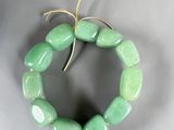 bracelet made of green jade beads with a gold plated clasp