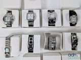 a lot of watches that are sitting in a box