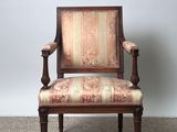 a chair that is sitting on the floor in the room